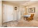 Inviting dining area featuring a wood table with four chairs and a neutral color palette at 14950 W Mountain View Blvd # 5306, Surprise, AZ 85374
