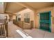 Exterior hallway featuring secure entrances and well-lit walkways at 14950 W Mountain View Blvd # 5306, Surprise, AZ 85374