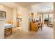 Open-concept living space showcasing a kitchen and a cozy living area with natural light at 14950 W Mountain View Blvd # 5306, Surprise, AZ 85374