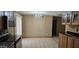 A kitchen featuring stainless steel appliances, wood cabinets, tile floors, and an ornate chandelier at 1586 S Lawther Dr, Apache Junction, AZ 85120
