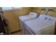 Laundry room with a white washer and dryer at 1586 S Lawther Dr, Apache Junction, AZ 85120