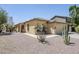 Charming single-story home featuring stucco exterior, tile roof, desert landscaping, and attached garage at 16159 W Maui Ln, Surprise, AZ 85379