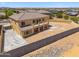 Aerial view of a two-story house showcasing an expansive backyard and neighborhood at 1712 E Joelle Dr, Casa Grande, AZ 85122