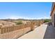 Covered back porch offers beautiful views of the surrounding desert landscape at 1712 E Joelle Dr, Casa Grande, AZ 85122