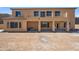 Spacious backyard features an outdoor covered patio, presenting design opportunities at 1712 E Joelle Dr, Casa Grande, AZ 85122