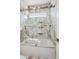Modern bathroom features a bathtub, shower with glass doors, and marble-style tile surround at 1712 E Joelle Dr, Casa Grande, AZ 85122