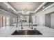 The chef's kitchen is open to the main living area and features modern fixtures at 1712 E Joelle Dr, Casa Grande, AZ 85122