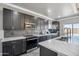 Well-equipped kitchen featuring sleek appliances, modern cabinets, and stylish countertops at 1712 E Joelle Dr, Casa Grande, AZ 85122