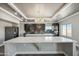 Bright, open kitchen featuring an island with a white countertop and stainless steel appliances at 1712 E Joelle Dr, Casa Grande, AZ 85122