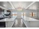 Spacious kitchen with dual islands, white countertops, dark wood cabinets, and mountain views at 1712 E Joelle Dr, Casa Grande, AZ 85122