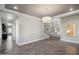 Open living area with modern fixtures and access to the staircase at 1712 E Joelle Dr, Casa Grande, AZ 85122