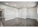 Large living room features tile flooring and is brightly illuminated with recessed lights at 1712 E Joelle Dr, Casa Grande, AZ 85122