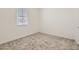 Carpeted bedroom with natural lighting and neutral paint, creating a relaxing retreat at 17557 W Victory St, Goodyear, AZ 85338