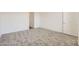 Bright, carpeted bedroom with neutral walls and ample natural light at 17557 W Victory St, Goodyear, AZ 85338