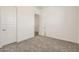 Comfortable carpeted bedroom featuring a neutral color palette and great natural light at 17557 W Victory St, Goodyear, AZ 85338
