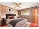 Cozy bedroom featuring a comfortable queen-sized bed, ample natural light, and stylish wood accents at 1810 N 74Th St, Scottsdale, AZ 85257