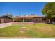Charming brick home with a covered front porch and a well-maintained lawn at 1810 N 74Th St, Scottsdale, AZ 85257