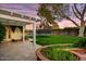 Beautiful backyard with lush lawn, perfect for outdoor activities and enjoyment, featuring a trampoline at 1831 E Rovey Ave, Phoenix, AZ 85016