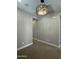 Empty bedroom featuring neutral colors, modern lighting, and ample space at 1840 S Follett Way, Gilbert, AZ 85295