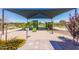 Community playground with modern play structures, shade, and a soft sand base, perfect for outdoor activities at 1840 S Follett Way, Gilbert, AZ 85295