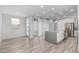 The gourmet kitchen showcases a large center island perfect for entertaining at 1848 S Follett Way, Gilbert, AZ 85295