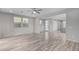 Bright living room featuring neutral colors, tile floors, and large windows at 1848 S Follett Way, Gilbert, AZ 85295