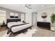 Serene main bedroom featuring neutral tones, a plush bed, and modern furnishings at 1848 S Follett Way, Gilbert, AZ 85295