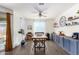 Bright dining room with stylish decor, wooden table, and ample natural light at 18581 W College Dr, Goodyear, AZ 85395