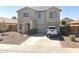 Charming two-story home featuring manicured landscaping and an attached two-car garage at 18629 W Fulton St, Goodyear, AZ 85338