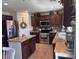Modern kitchen with granite countertops, stainless steel appliances, and ample cabinet space at 18629 W Fulton St, Goodyear, AZ 85338