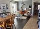 Bright and airy living room with a dining table and an open-concept design at 18629 W Fulton St, Goodyear, AZ 85338