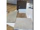 Selection of interior finish materials, including flooring, tiling, and cabinetry samples displayed at 20025 W Campbell Ave, Buckeye, AZ 85396