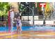 Young playing in the community splash pad at 20025 W Campbell Ave, Buckeye, AZ 85396