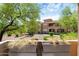 A lush view of the complex with mature trees providing shade to manicured lawns, offering a serene environment at 20100 N 78Th Pl # 1023, Scottsdale, AZ 85255
