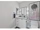 Chic powder room with modern lighting, neutral paint, and stylish fixtures at 20100 N 78Th Pl # 1023, Scottsdale, AZ 85255
