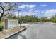 Street view features the community map, manicured landscaping, and the secure gated entry at 20100 N 78Th Pl # 1023, Scottsdale, AZ 85255