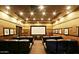 Cozy movie theater room with plush seating and a large projector screen at 20100 N 78Th Pl # 1023, Scottsdale, AZ 85255
