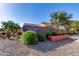 Desert Oasis community entrance sign surrounded by lush landscaping at 20283 N 273Rd Ave, Buckeye, AZ 85396