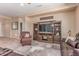 Cozy living room with entertainment center and plush seating at 20283 N 273Rd Ave, Buckeye, AZ 85396