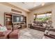Comfortable living area with large windows and stylish furnishings at 20283 N 273Rd Ave, Buckeye, AZ 85396