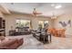 Spacious living room features large windows with plenty of natural light at 20283 N 273Rd Ave, Buckeye, AZ 85396