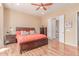 Spacious main bedroom with hardwood floors and ensuite bathroom access at 20283 N 273Rd Ave, Buckeye, AZ 85396