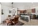 Inviting kitchen showcasing stainless steel appliances, wooden cabinets, and adjacent dining area at 2048 S Martingale Rd, Gilbert, AZ 85295
