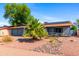 Attractive home with desert landscaping, solar panels, and a well-maintained front yard at 2114 E Sesame St, Tempe, AZ 85283