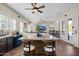 Spacious open-concept with island seating, wooden floors, and comfortable living space at 22634 N 47Th Pl, Phoenix, AZ 85050