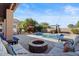 Backyard view showcasing a beautiful pool, spa, and outdoor seating area at 22634 N 47Th Pl, Phoenix, AZ 85050