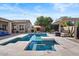 Swimming pool with spa, patio area, outdoor grill, and pergola at 22634 N 47Th Pl, Phoenix, AZ 85050