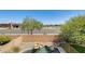 Backyard view of pool, rock feature, and low-maintenance desert landscaping at 2762 E Clifton Ave, Gilbert, AZ 85295