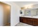 Bathroom with a double sink vanity and large mirror providing lots of light at 2762 E Clifton Ave, Gilbert, AZ 85295