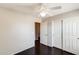 This bedroom has a large closet and features wood floors at 2762 E Clifton Ave, Gilbert, AZ 85295